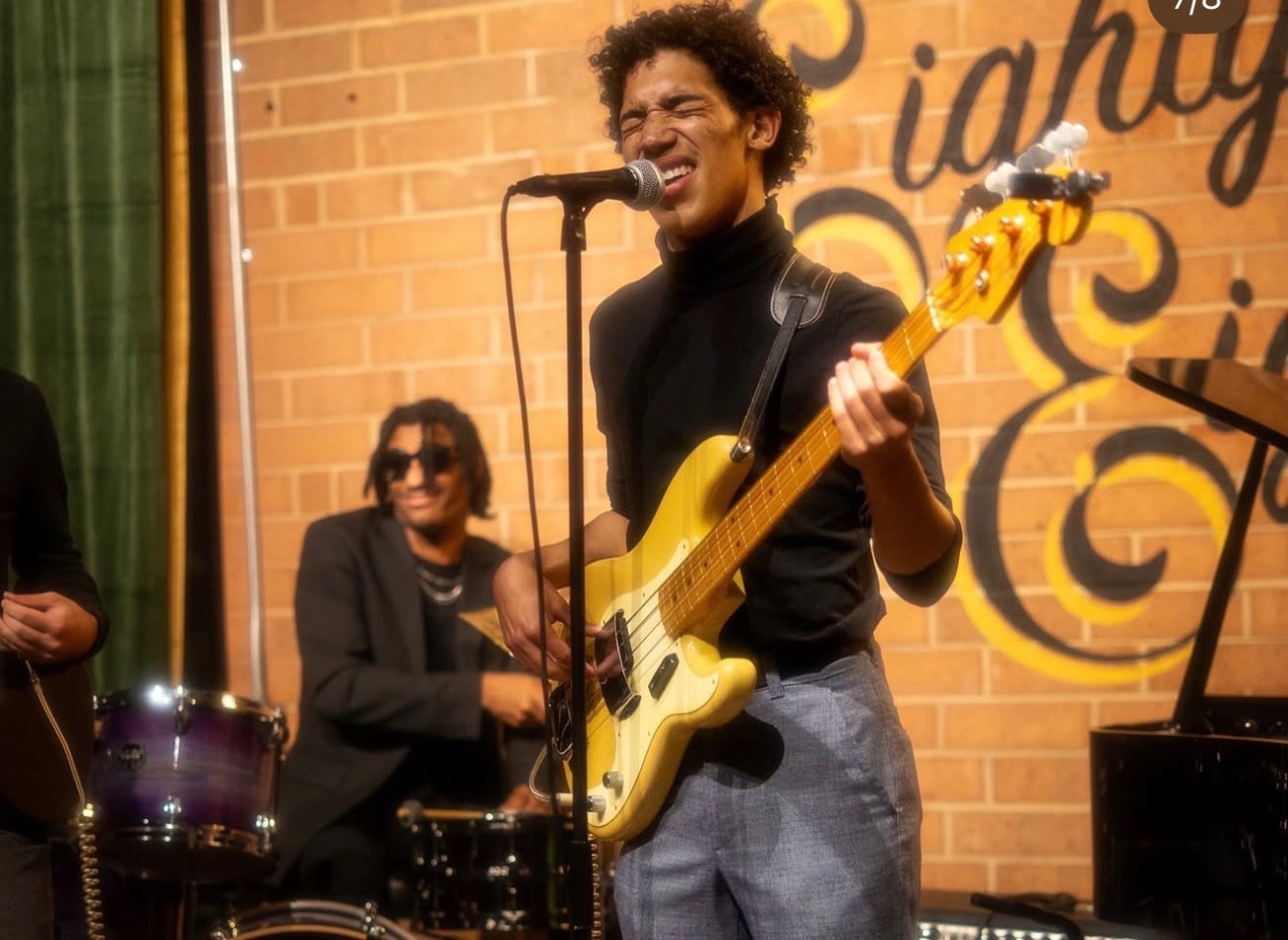Soul artist Garrison performing with Jaywill on drums